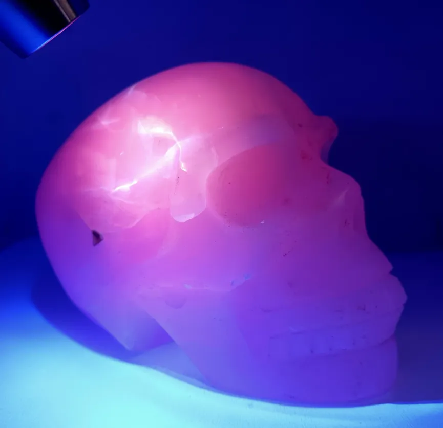 930G UV Reactive Pink Calcite Crystal Skull