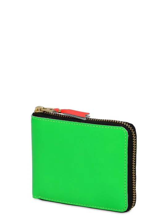 Comme des Garçons Wallet   Super fluo leather zip-around wallet 