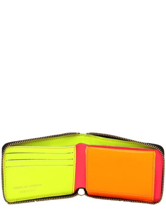 Comme des Garçons Wallet   Super fluo leather zip-around wallet 