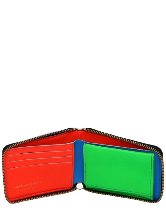 Comme des Garçons Wallet   Super fluo leather zip-around wallet 