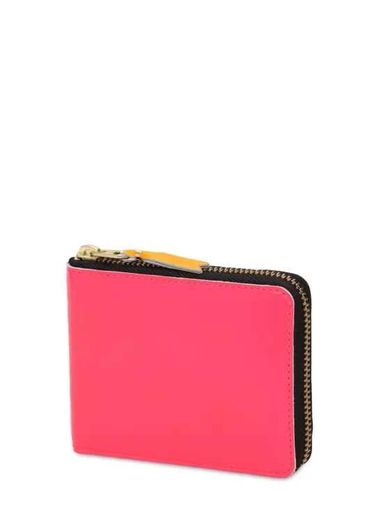 Comme des Garçons Wallet   Super fluo leather zip-around wallet 