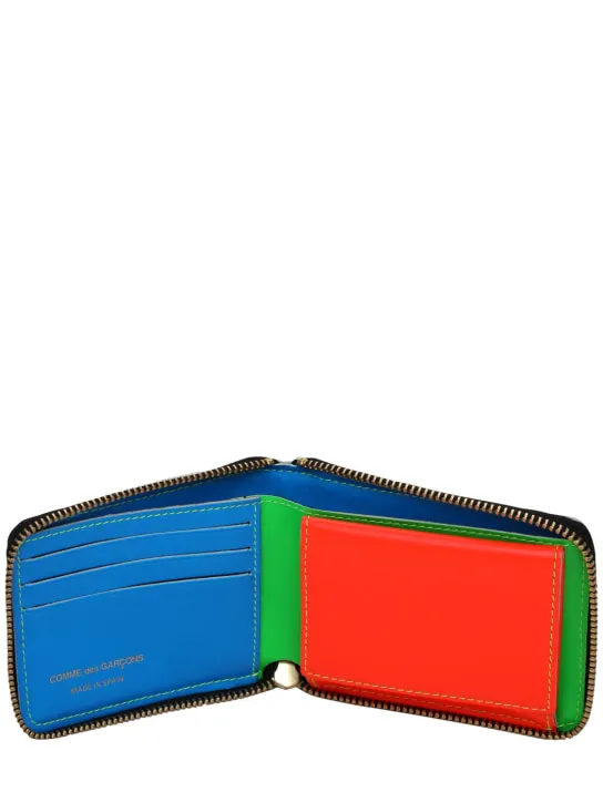 Comme des Garçons Wallet   Super fluo leather zip-around wallet 