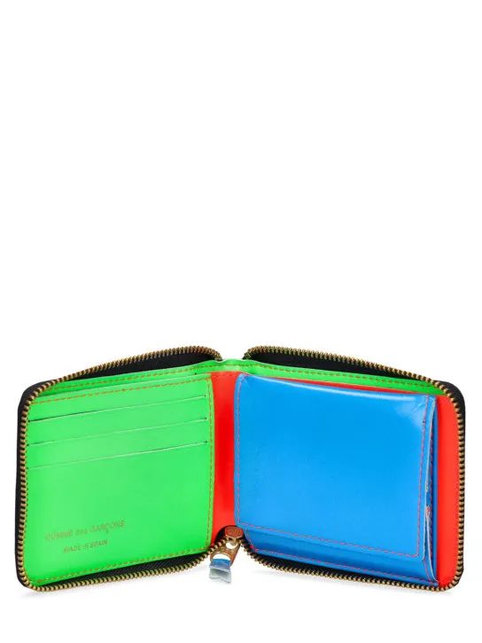 Comme des Garçons Wallet   Super fluo leather zip-around wallet 