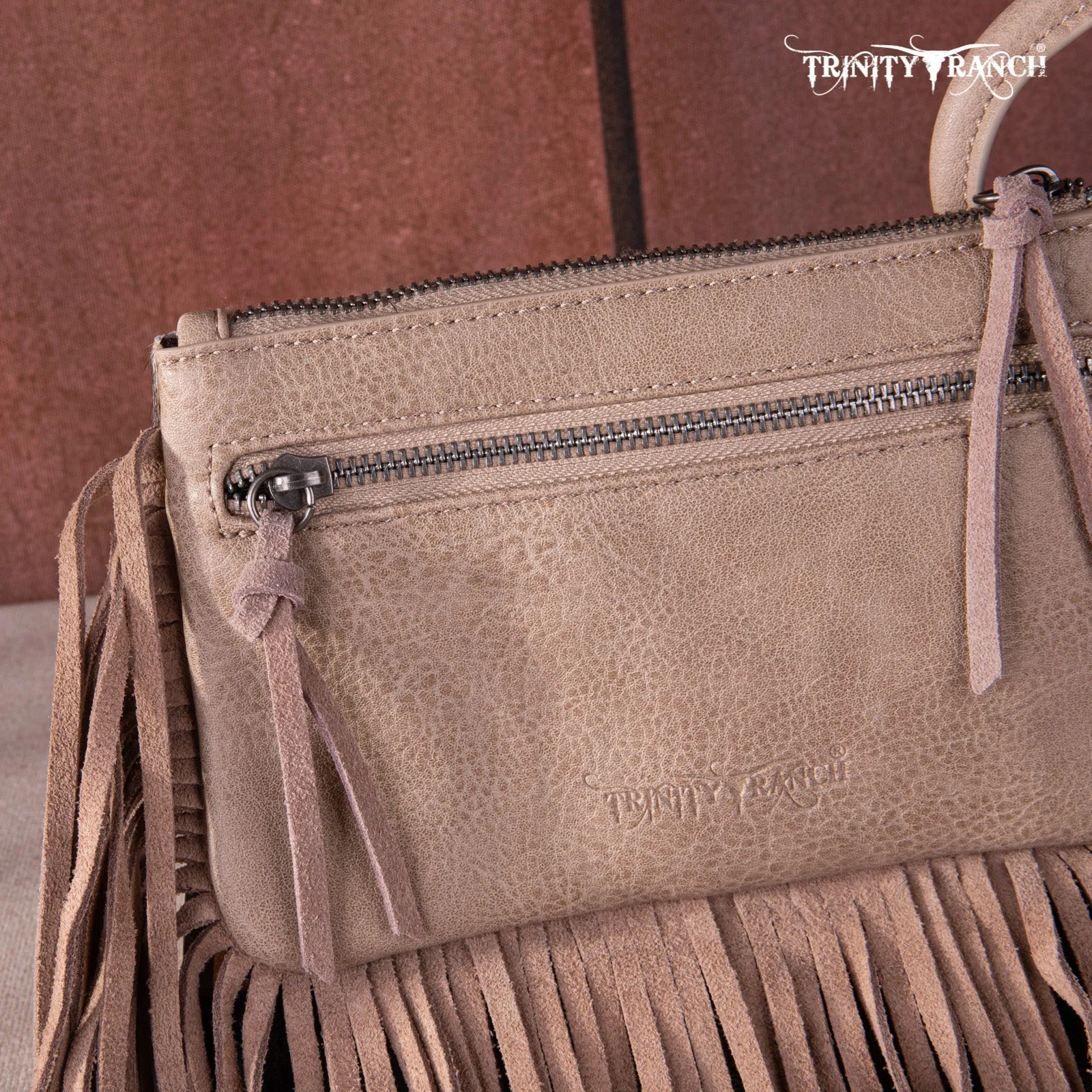 TR167-A181 Trinity Ranch Genuine Hair-On Cowhide Ring Handle Wristlet Clutch Bag - Tan