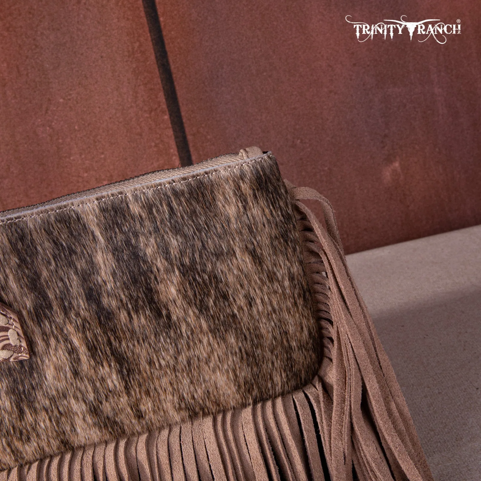 TR167-A181 Trinity Ranch Genuine Hair-On Cowhide Ring Handle Wristlet Clutch Bag - Tan